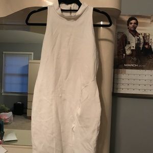 White sleeveless dress with slit